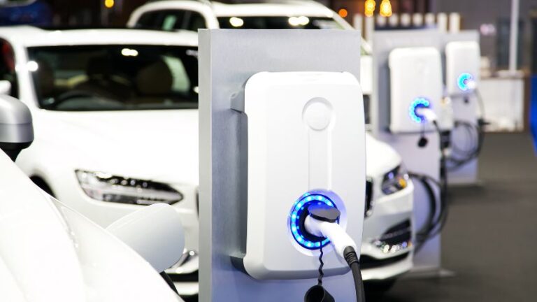 row of ev chargers in a garage