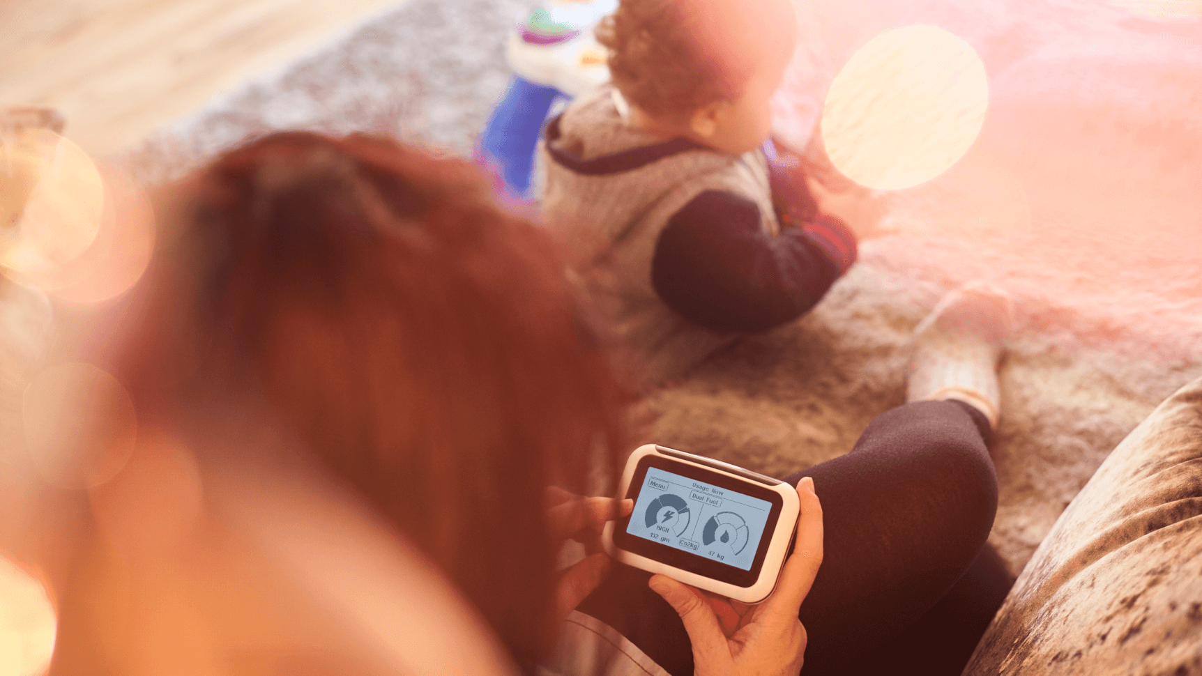 mother caring for child and monitoring smart meter